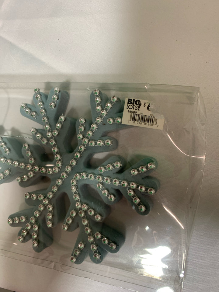 3 BLUE SNOWFLAKE ORNAMENTS.