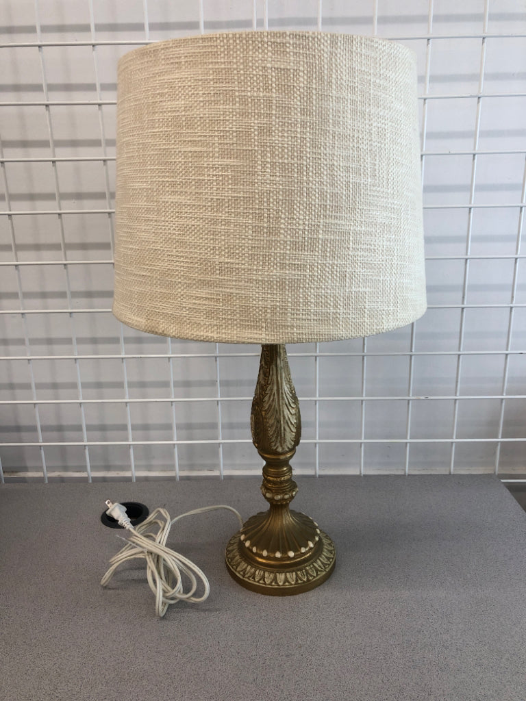 LAMP W/ PAINTED GOLD ETCHED BASE W/TAN FABRIC SHADE.