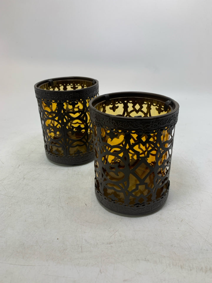2 YELLOW GLASS W/ PIERCED BROWN CAGE TEALIGHT HOLDERs.