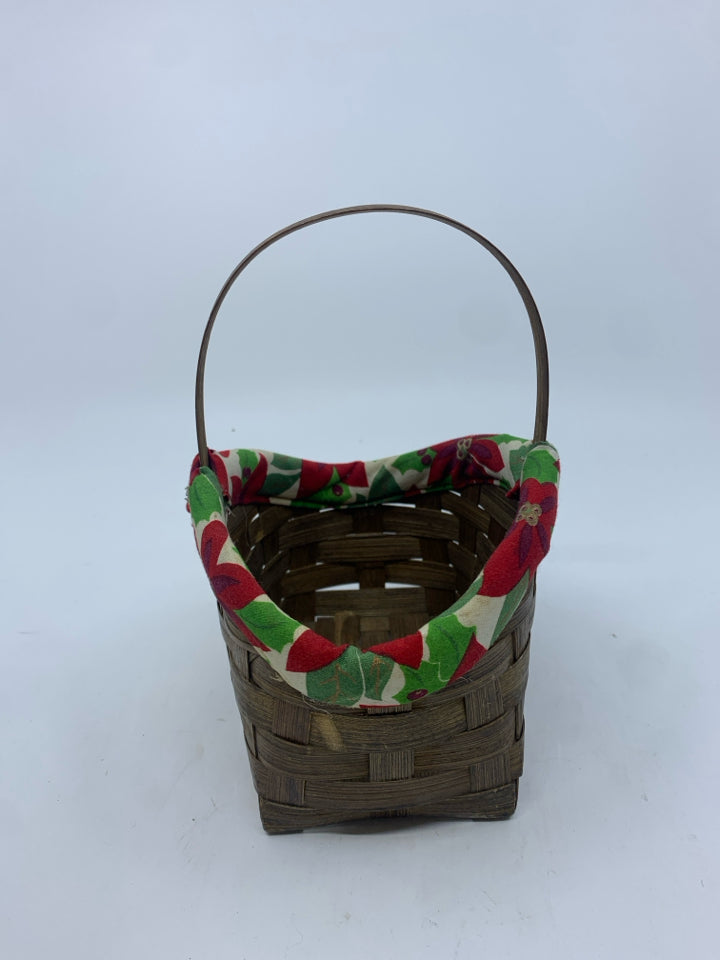 SMALL DARK BASKET W POINSETTIA FABRIC RIM.