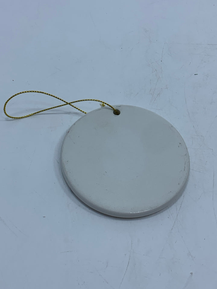 CERAMIC WHEN A CARDINAL CIRCLE ORNAMENT.