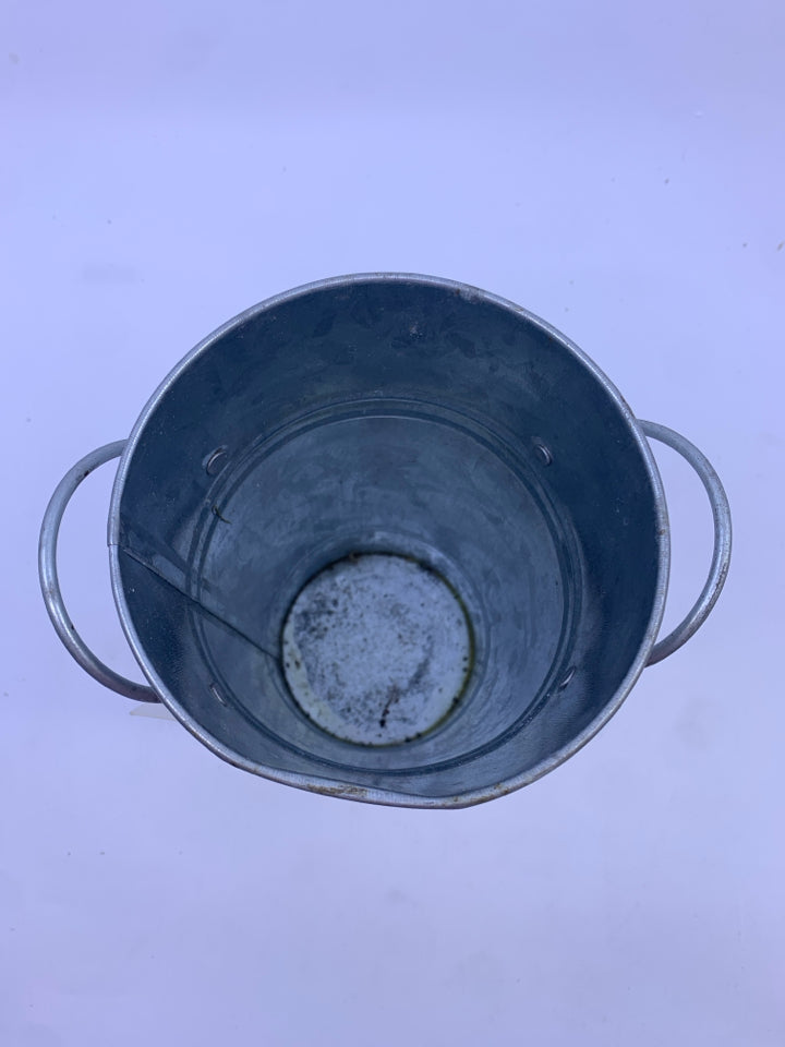 GALVANIZED METAL BUCKET W HANDLES.