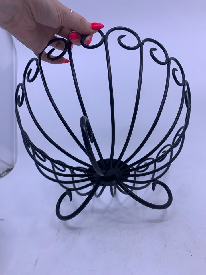 BLACK METAL FOOTED FRUIT BOWL.