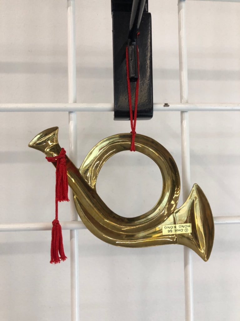 TRUMPET SHAPED BRONZE ORNAMENT.