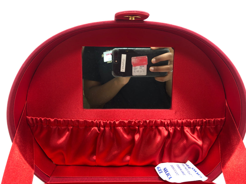 RED CLOTH MAKEUP CARRIER.
