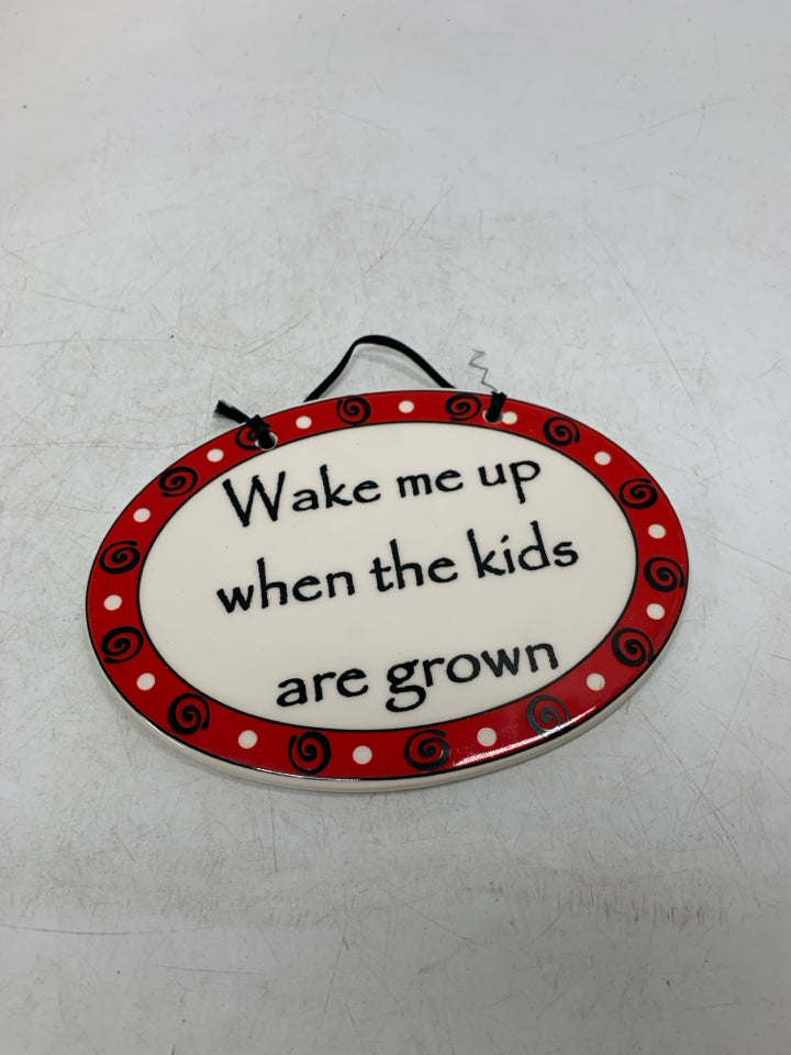 WAKE ME UP WHEN CERAMIC OVAL SIGN.
