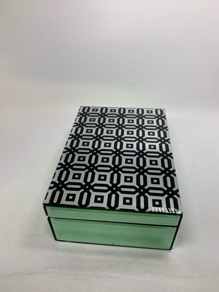 GLASS MIRRORED BOX W/ BLACK GEOMETRIC PATTERNED TOP.
