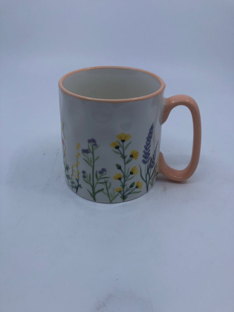 PEACH RIM MULTI COLORED FLOWERS MUG.