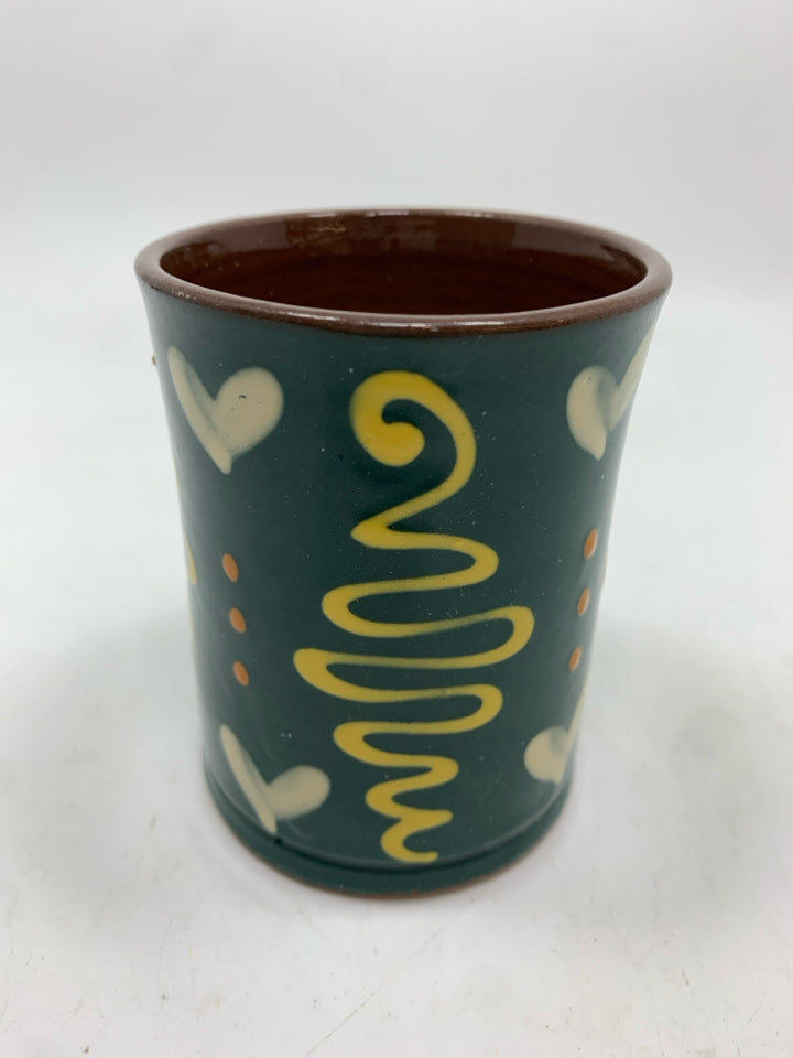 YELLOW HEART TERRA COTTA CUP.