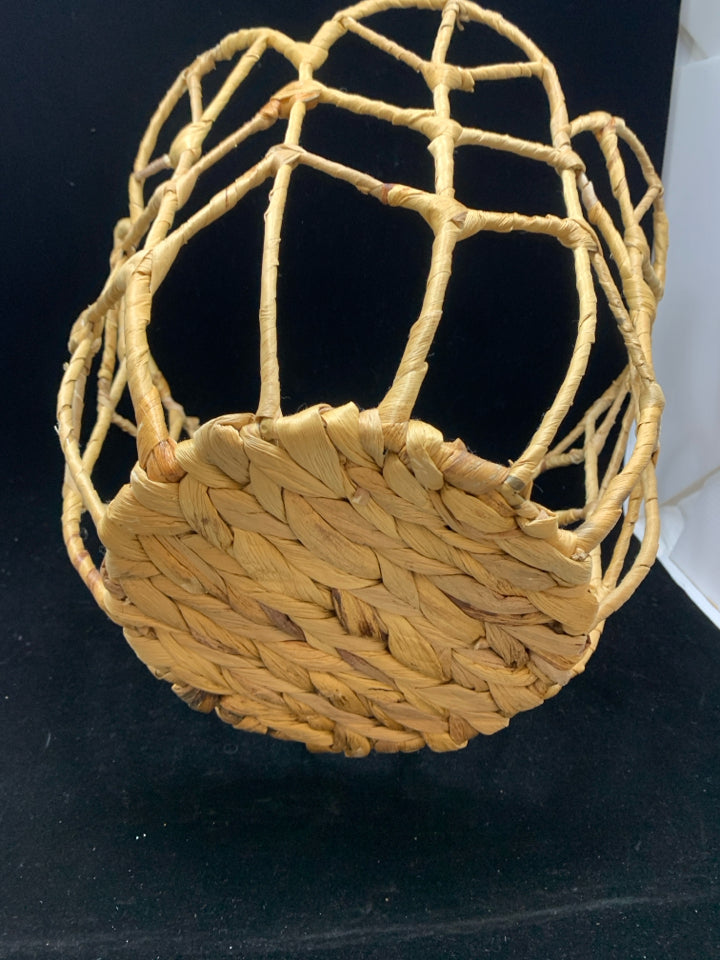 TULIP SHAPED WICKER BASKET.