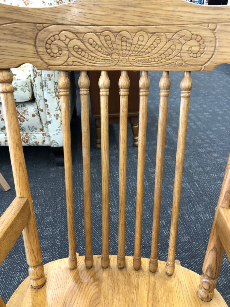 CHILDRENS WOOD ROCKING CHAIR W/ ARM RESTS.