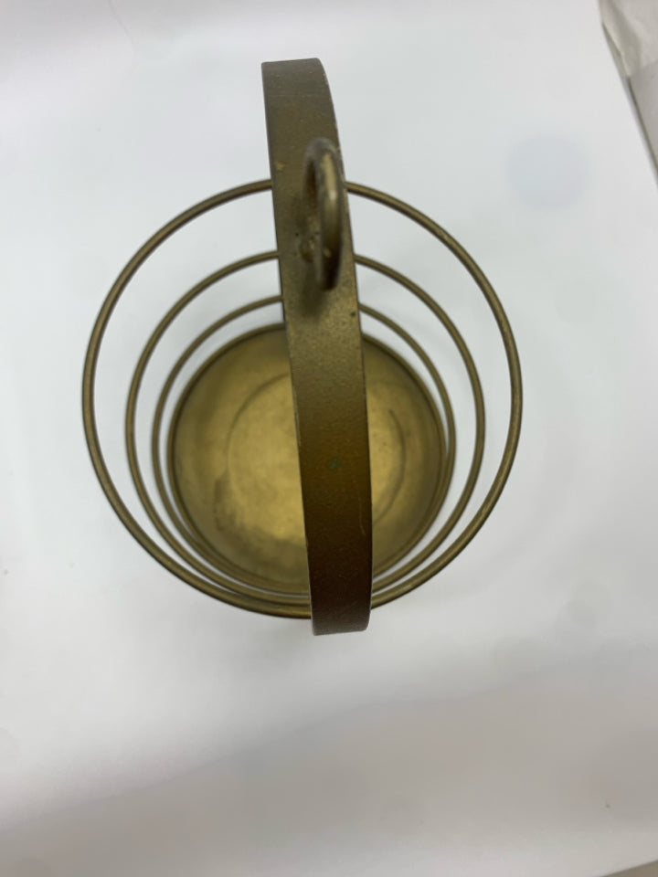 SWINGING GOLD CANDLE LANTERN.