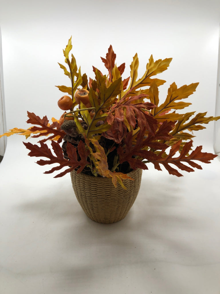 AUTUMN LEAVES/PINECONES IN WOVEN STONE VASE.