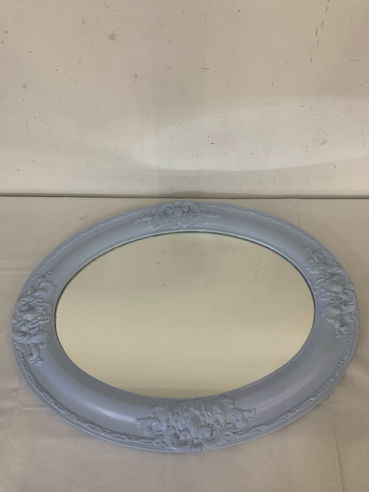 LIGHT BLUE PAINTED OVAL MIRROR EMBOSSED DESIGNS.