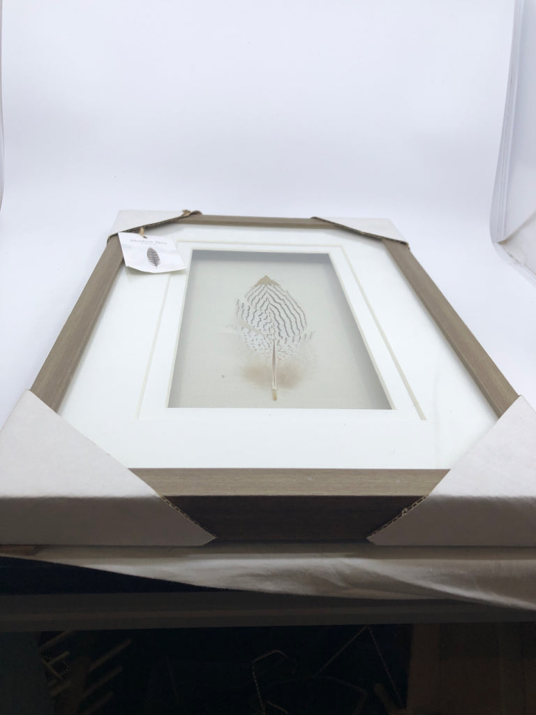 NIP FEATHER SHADOW BOX WALL ART.