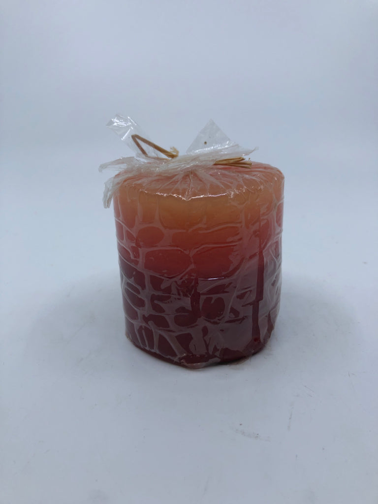 RED OMBRE PILLAR CANDLE.