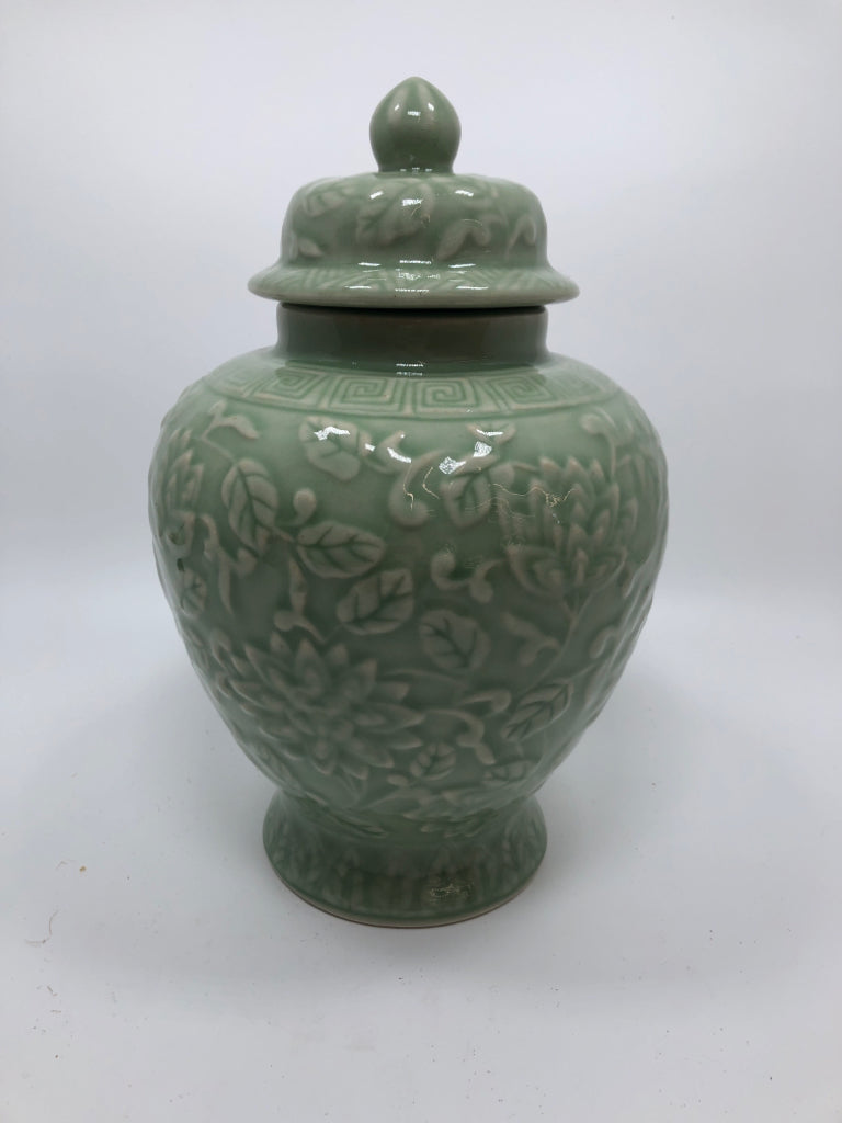 GREEN CERAMIC GINGER JAR W/EMBOSSED FLOWERS.
