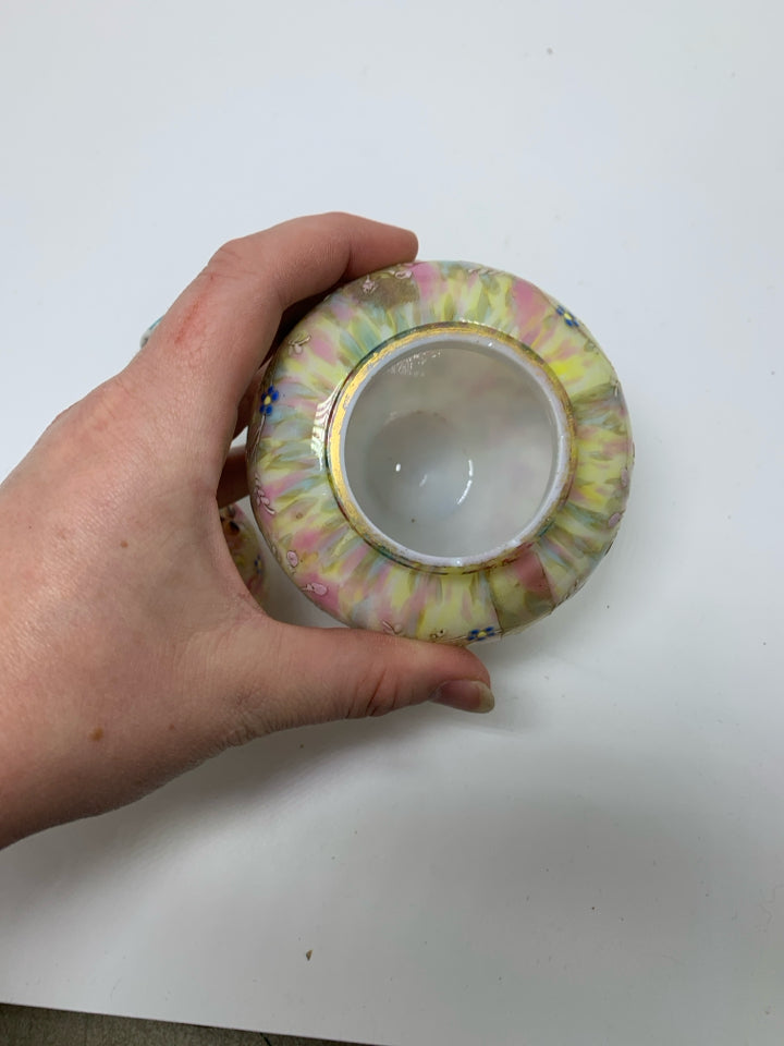 MULTI COLORED SMALL GLASS GINGER JAR W/ PAINTED CLOVERS.