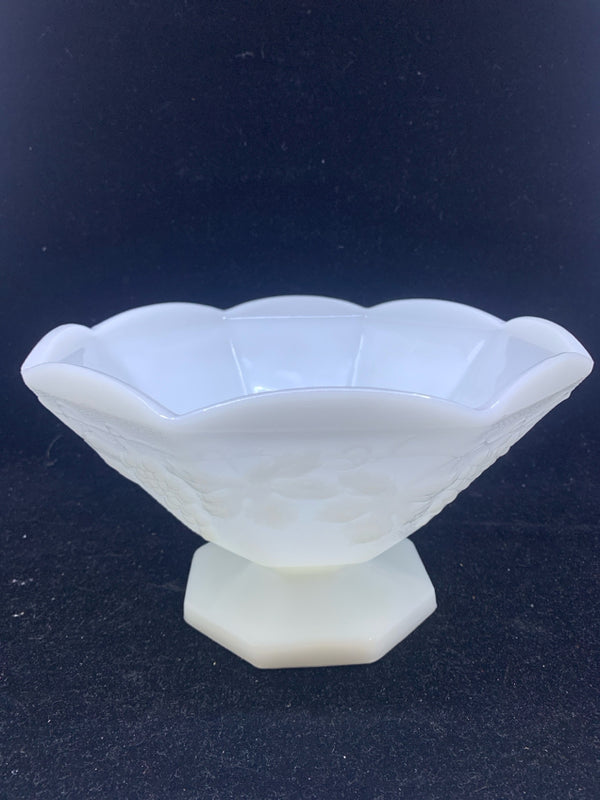 MILK GLASS FOOTED BOWL W/ EMBOSSED GRAPES SCALLOP EDGE.