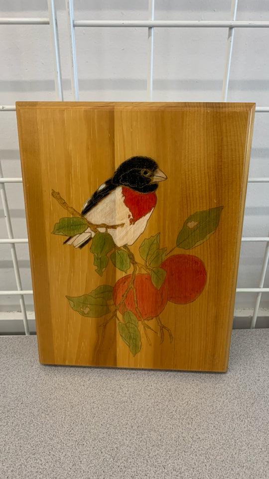 CARVED BIRD ON FRUIT TREE WOOD HANGING.
