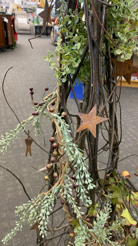 PRIMITIVE TWISTED BRANCH TREE W/STARS.