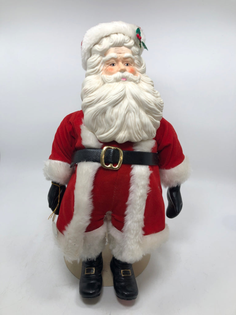 LARGE PORCELAIN SANTA ON STAND.