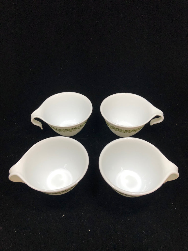 4 CORELLE GREEN FLOWER COFFEE MUGS.