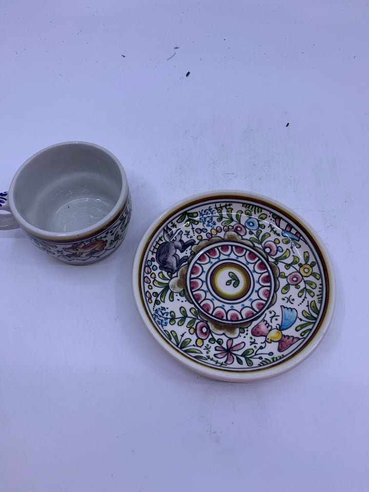 MEXICAN POTTERY FLORAL PATTERN W RABBIT TEACUP AND SAUCER.