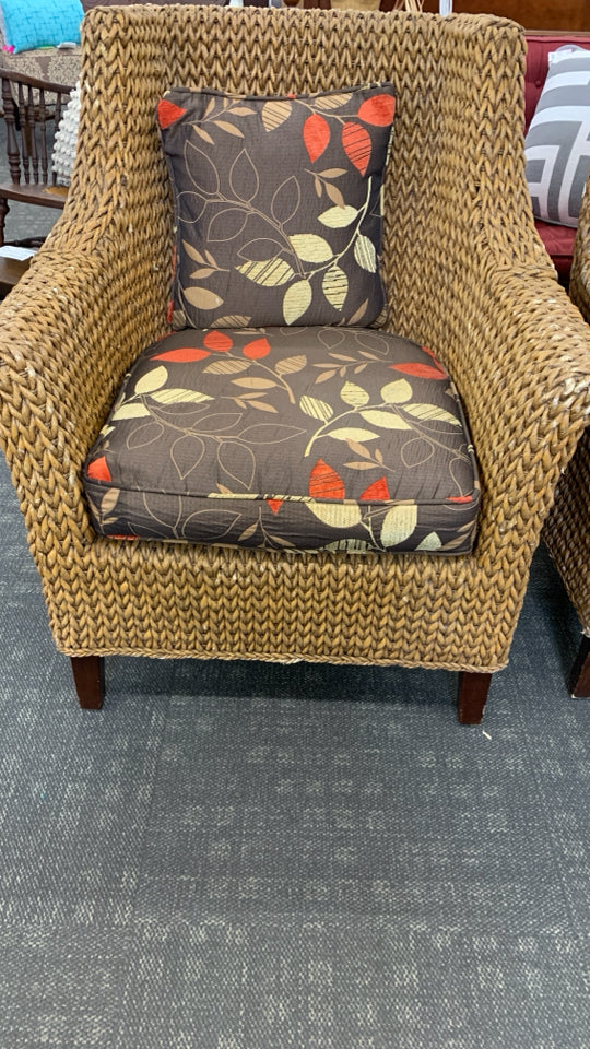 WICKER CHAIR W/BROWN CUSHION.