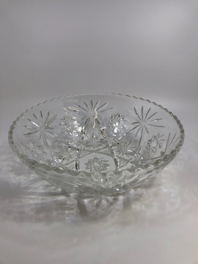 CUT GLASS BOWL W/SCALLOPED EDGE STAR PATTERN.