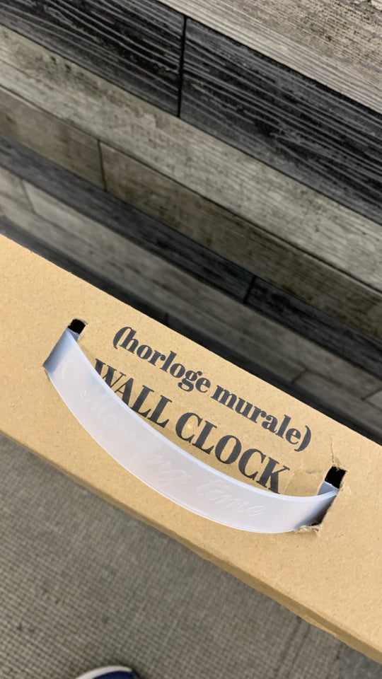 NIB WHITE WASHED PLASTIC WALL CLOCK.