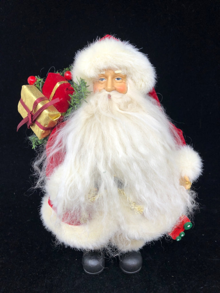 SANTA W/ LONG BEARD VELOUR RED SUIT HOLDING BAG OF PRESENTS.