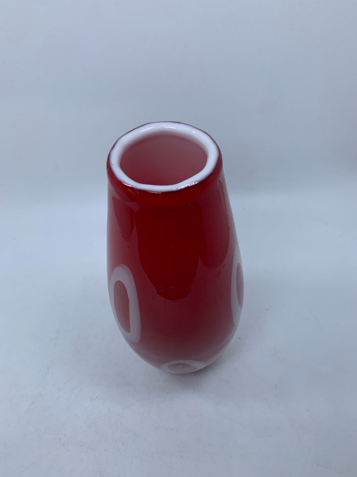 HEAVY RED BLOWN GLASS VASE W/ WHITE CIRCLES.