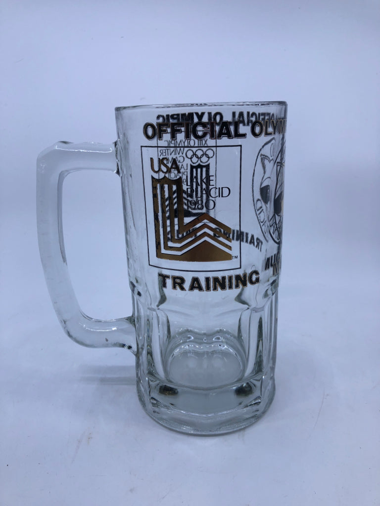 LARGE OFFICIAL 1980 LAKE PLACID OLYMPIC BLACK+GOLD BEER STEIN.