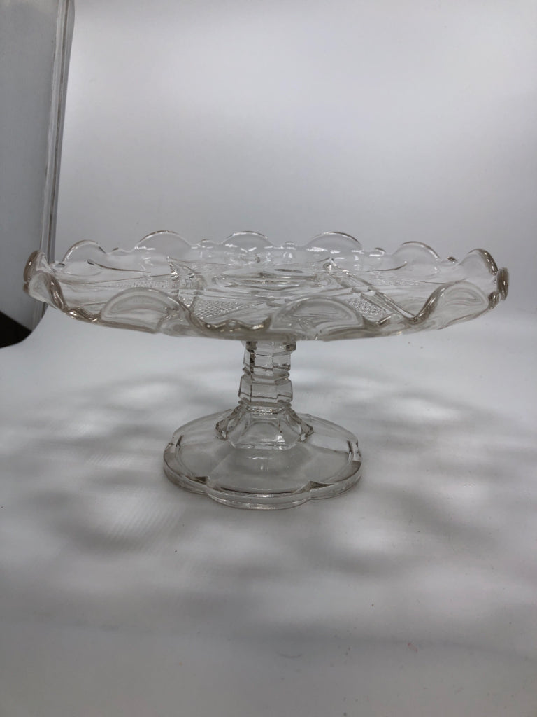 CLEAR GLASS CAKE STAND W/STAR ETCHING.