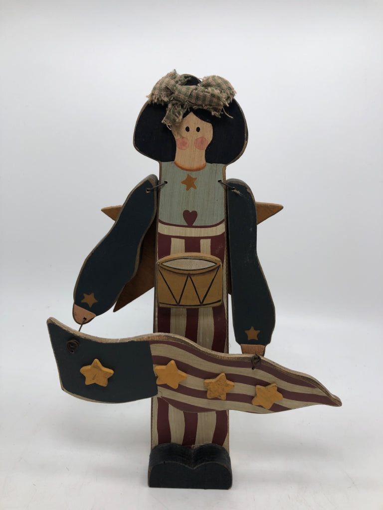 AMERICANA WOOD DRUMMER DOLL HOLDING FLAG.