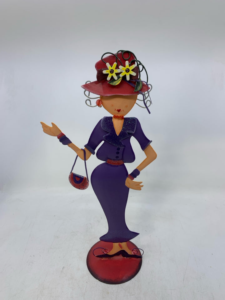 METAL STANDING WOMAN W/ PURPLE DRESS, SHOES SPARKLE COLLAR.