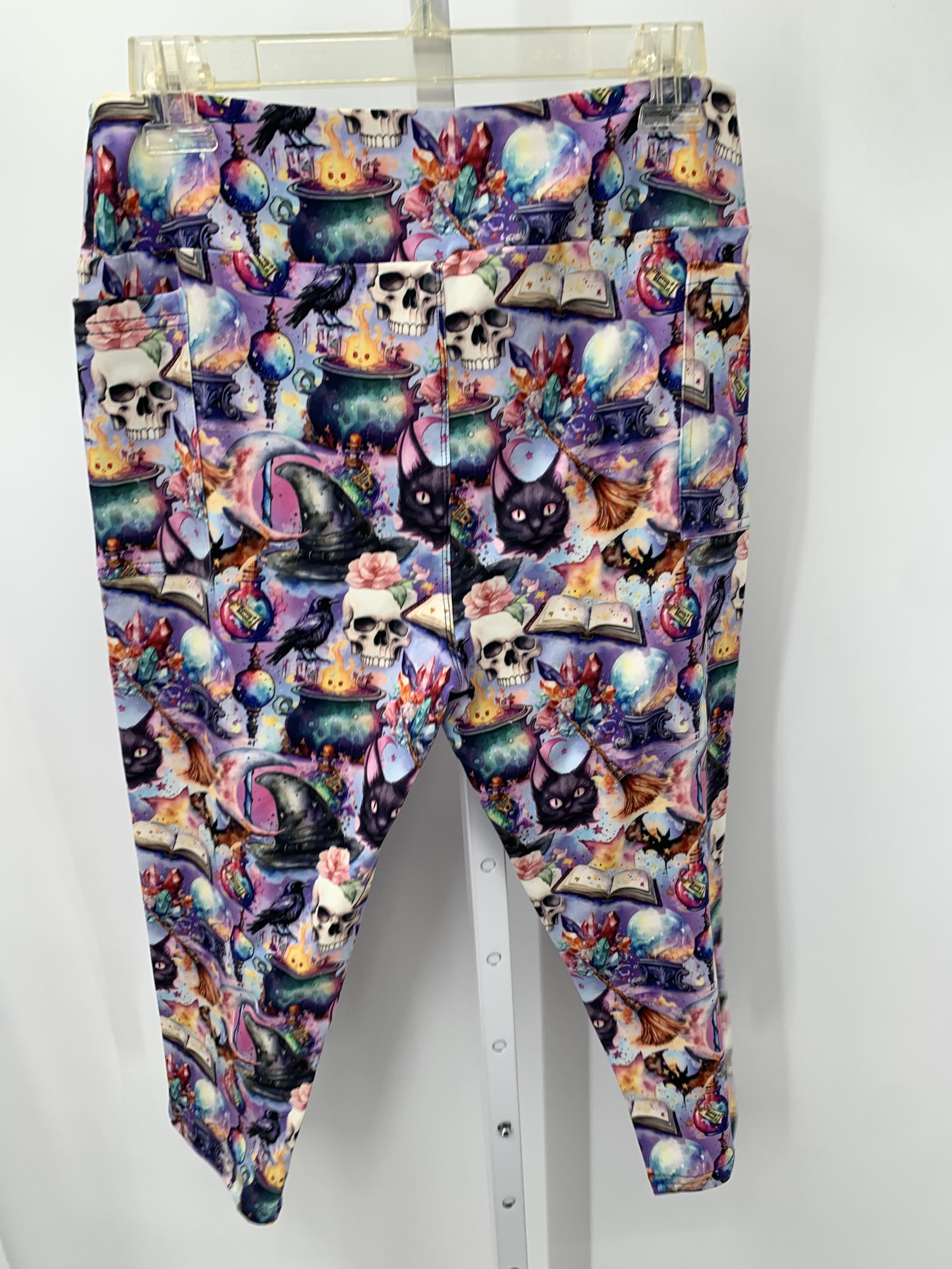 NWOT CAPRI LEGGINGS SPOOKY PATTERN.