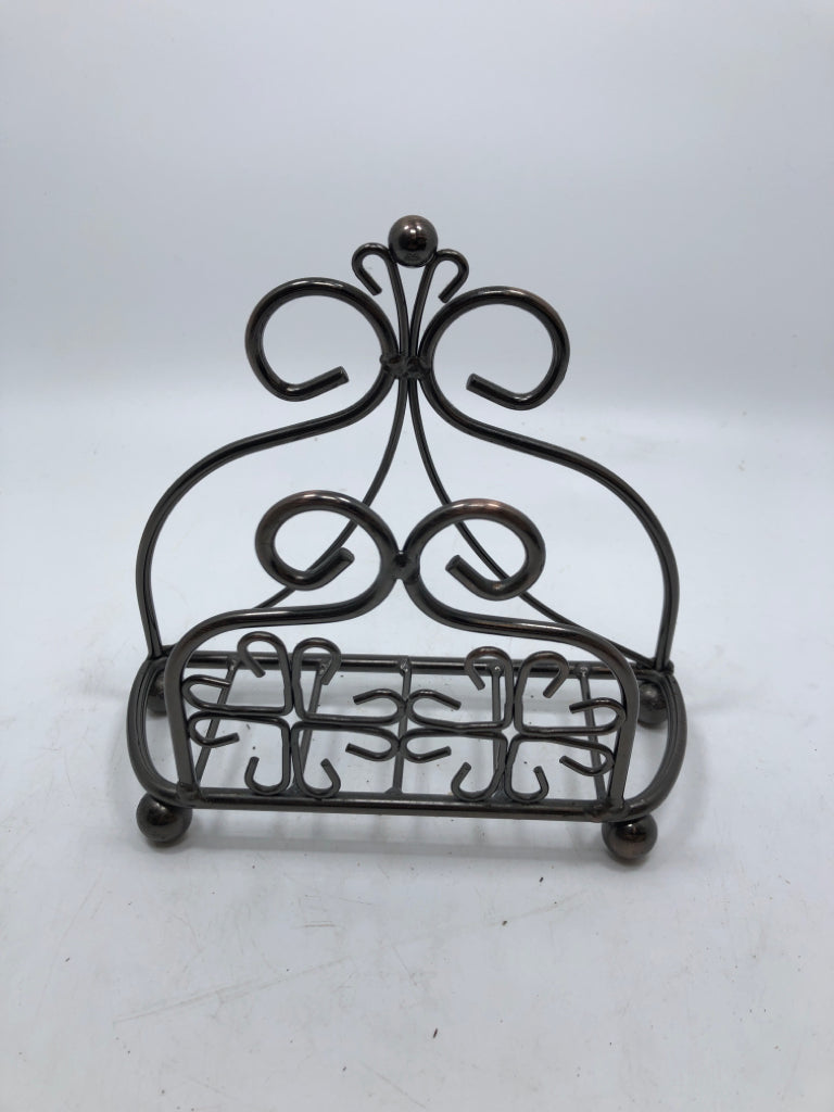 SCROLL METAL NAPKIN HOLDER.