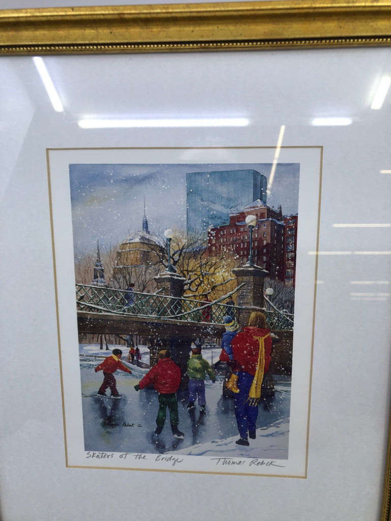 SKATERS AT THE BRIDGE IN GOLD FRAME WALL DECOR.