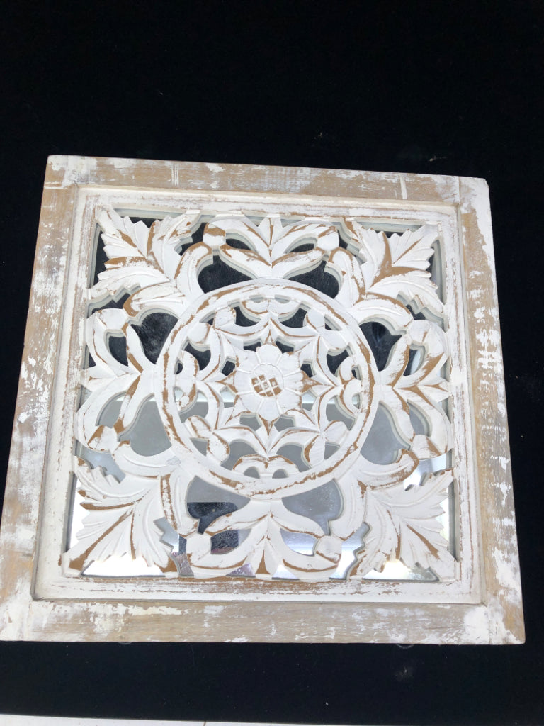 DISTRESSED WOOD CUT OUT WALL ART W/ MIRROR BEHIND.