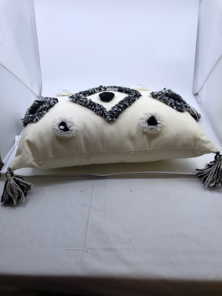BLACK/WHITE BOHO RECTANGLE PILLOW W/ TASSELS.