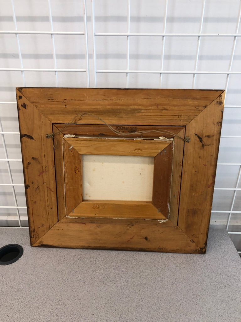 PAINTED ORANGE/YELLOW FLOWERS IN CARVED WOOD FRAME.