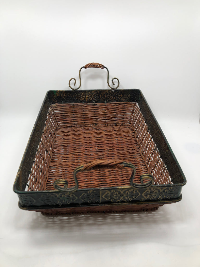 DRK BROWN RECTANGLE WICKER BASKET W/METAL SCROLL RIM AND HANDLES.