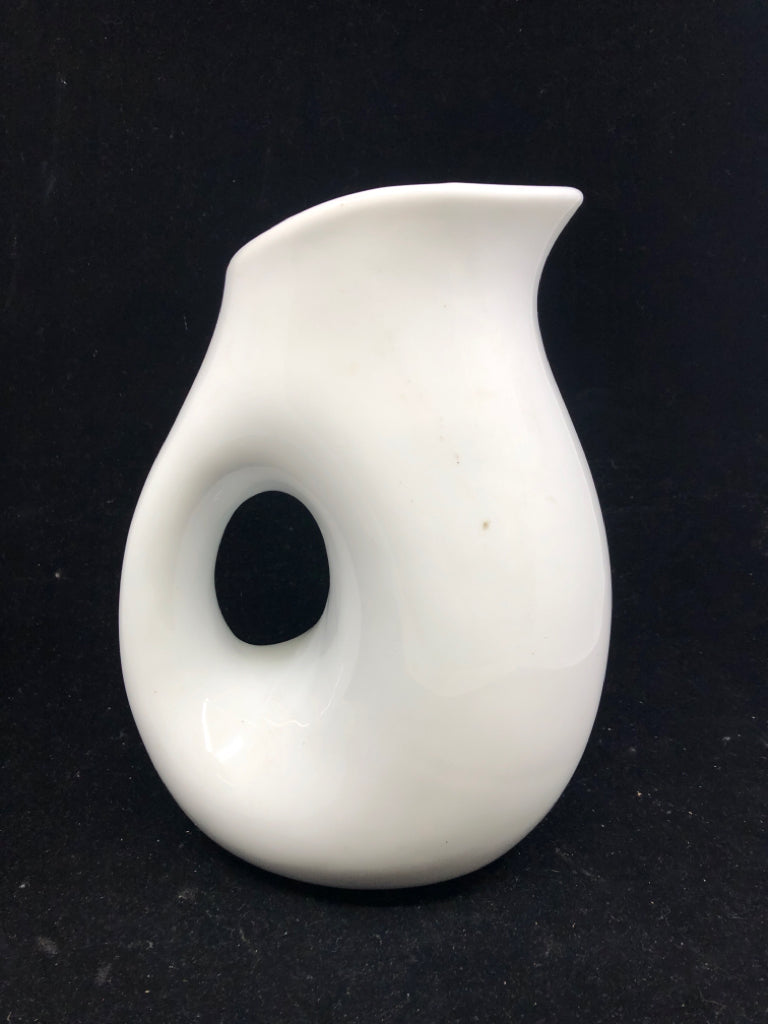 WHITE MODERN CERAMIC PITCHER.