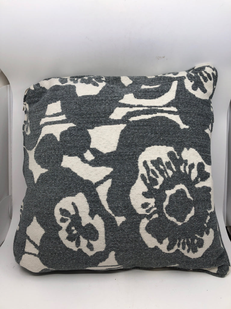 WHITE W/ BLUE/GRAY FLORAL PATTERN PILLOW.