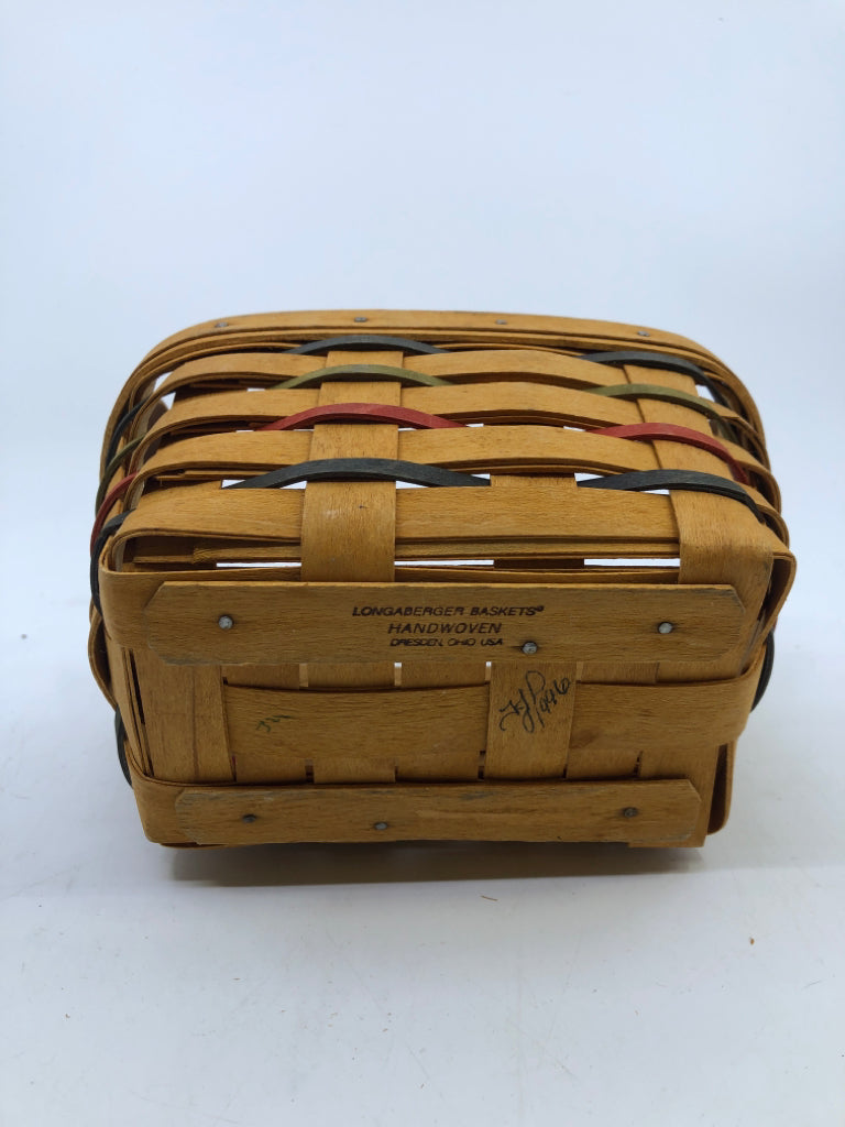 1996 ROUNDED RECTANGLE BASKET WITH 2 LEATHER HANDLES BLUE/GREEN/RED WEAVE.