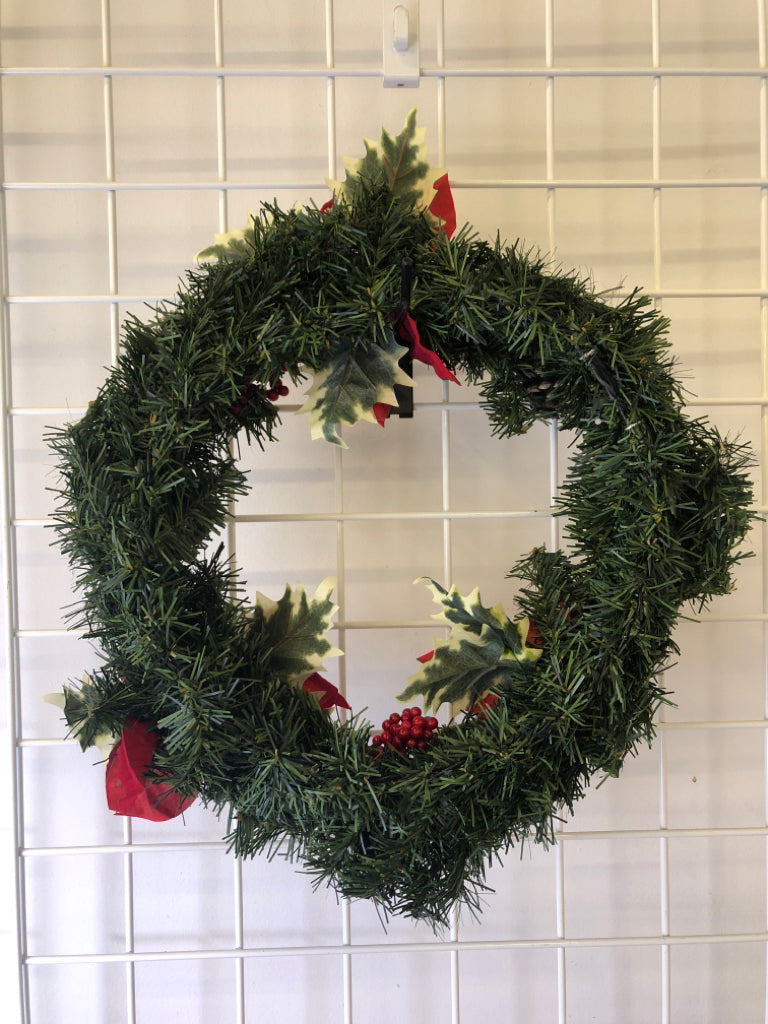 POINSETTIA AND PINE CONES WREATH DOOR HANGING.