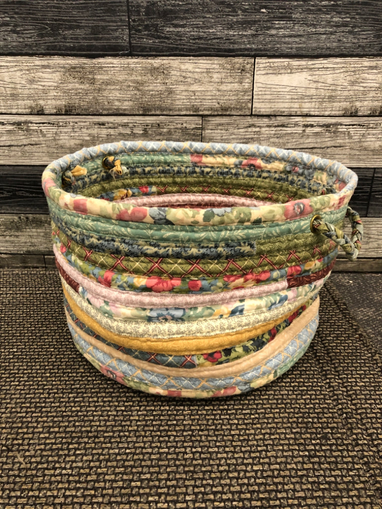 QUILTED STRIPED FABRIC BASKET.