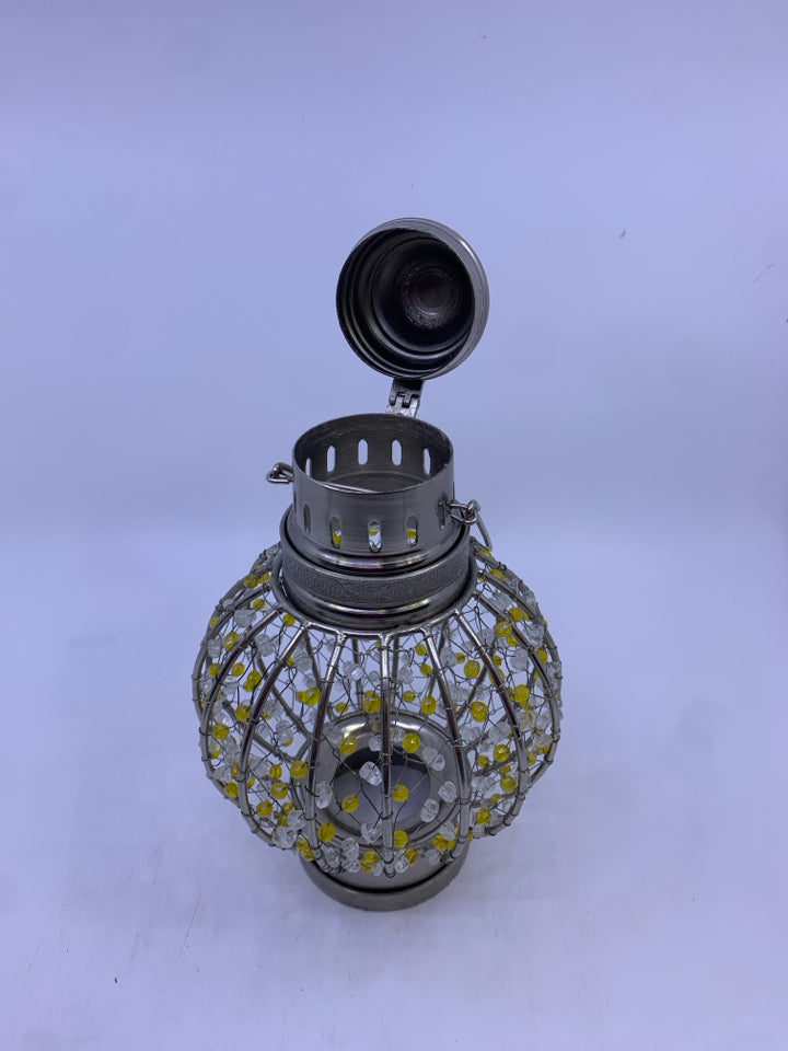 SILVER METAL YELLOW WHITE BEADED CANDLE LAMP.